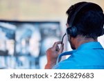 Small photo of Police dispatch, communication headset and man talking, speaking and consulting with security, monitor CCTV or callcenter. Conversation, support consultation and back of person chat about 911 service