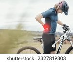 Small photo of Man, bicycle and back pain in fitness injury, cycling or ache from exercise, workout or cardio in nature outdoors. Male person or cyclist with sore hip, tense muscle or spine in discomfort on bike