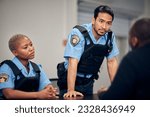 Small photo of Interrogation, arrest and police team with a suspect for questions as law enforcement officers. Security, crime or investigation with a serious man and woman cop talking to a witness for information
