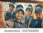 Small photo of Paintball team, happy selfie and group together, smile and happiness for action game, army mission and memory photo. Battlefield arena, war soldier and military post training picture to social media