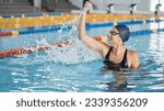 Small photo of Swimming, success or happy winner in celebration for achievement in race or pool competition. Fitness, wellness or excited woman swimmer winning sports game with victory or championship performance