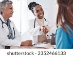 Small photo of Happy nurses, teamwork or doctors shaking hands for interview, good job or promotion success in meeting. Hospital, congratulations or proud healthcare worker with handshake for medical collaboration