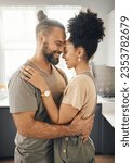Small photo of Interracial couple, hug and forehead touch in kitchen, love and bonding with happiness while at home. Trust, support and commitment, affection and embrace with people in a healthy relationship