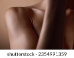 Healthy, skin and body closeup on woman, shoulder or natural glow and skincare texture in studio with cosmetics. Beauty, self care and arm of female model with clean, hygiene and aesthetic wellness