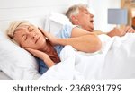 Small photo of Snoring, problem and woman with frustrated with noise, sound or husband sleeping in bed with wife. Elderly, couple and man snore in sleep in retirement home bedroom and lady with hands on ears