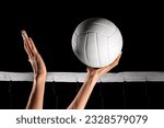 Small photo of Professional volleyball players in action on the volleyball court. Volleyball player. Sports banner. Attack concept with copy space. Volleyball Equipment and Accessories. sportsman playing volley ball
