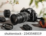 Small photo of Photo Camera. professional DSLR photo camera body with lens. photography concept. photography camera. photography equipment. Professional photographer accessories background. copy space.