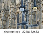 Small photo of Wells, Somerset, uk. January 11th 2023. Vicars close, Wells. Wells Cathedral signpost with copy space. Signs for Bishops palace, Market place and Vicars close. Focus on the black signpost.