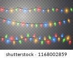 Christmas lights. Colorful Xmas garland. Vector red, yellow, blue and green glow light bulbs on wire strings isolated.