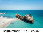 Small photo of Gulf Dove Omani Ship Stranded on the Beach of Socotra Island, Yemen, taken in November 2021, post processed using exposure bracketing