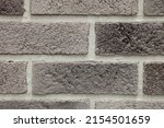 Brick Wall With Gray Porous...