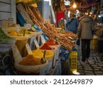 Small photo of Sousse Tunisia - Dec 20 2023: A stall selling dried dates and spices within the souk in he ancient medina of Sousse, Tunisia. The medina is a UNESCO World Heritage Site.