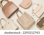 Fashionable woman bag on color background, top view