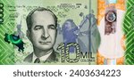 Small photo of Jose Figueres Ferrer with himself pictured in the background abolishing the Costa Rican Army. Portrait from Costa Rica 10 000 Colones 2019 Banknotes. Bangkok-Thailand, December, 21, 2023.