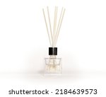  Wooden aroma sticks in a glass flask filled with flavor liquid substance isolated over white background, side view                              