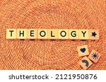 Small photo of THEOLOGY word text from wooden cube block letters on braided rattan mats background. Theology is the systematic study of the nature of the divine and, more broadly, of religious belief.