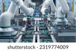 Small photo of Fully Automated Modern PCB Assembly Line Equipped with Advanced High Precision Robot Arms at Bright Electronics Factory. Component Installation on Circuit Board. Electronic Devices Production Industry