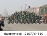Small photo of New Delhi, India 01-17-2022 - ITBP Dare Devil bikers team practice stunts during the rehearsal for the upcoming Republic Day parade at Rajpath