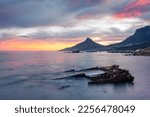 Small photo of Ship wreak with Lions Head in the background