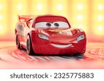 Small photo of Madrid, Spain; 06-26-2023: Toy car named Lightning McQueen from the famous Pixar Cars franchise