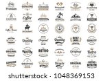 vintage retro vector logo for... | Shutterstock .eps vector #1048369153