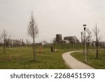 Small photo of view of a glimpse of a public park on the outskirts of Millan