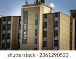 Small photo of ESSEN, GERMANY - NOVEMBER 13, 2022: Logo of Fleming's on their Essen hotel. Flemings Hotel is a german chain of hotels spread in Europe.
