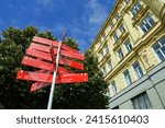 Directional street sign in Brno, Czechia with all the major sites listed, including St. Peter and Paul's Cathedral, Cabbage Market, Old Town Hall. Brno, Czech Republic has several historic landmarks.
