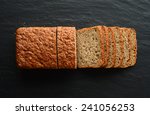 Whole Wheat Bread On A Black...