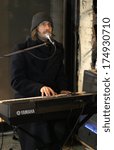 Small photo of MARCH 6, 2010 - BERLIN: Maximilian Hecker at a street concert in the Torstrasse, Berlin-Mitte.