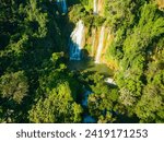 Small photo of Aerial View The most beautiful waterfalls in Thailand. Thi Lo Su Waterfall The Largest Waterfall in Thailand Thi Lo Su Waterfall stands tall as a hidden gem within Umphang Wildlife Sanctuary