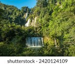 Small photo of Aerial View The most beautiful waterfalls in Thailand. Thi Lo Su Waterfall The Largest Waterfall in Thailand Thi Lo Su Waterfall stands tall as a hidden gem within Umphang Wildlife Sanctuary