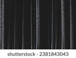 A close-up of pine tree trunks with a bit of snow in a dark forest, moody atmosphere, matte and textured effect, monochrome, minimalism