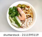 Small photo of Sarawak Laksa, a spicy noodle soup dish, originating from the state of Sarawak, Malaysia