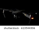 Drone advanced system flying taking off in black background
