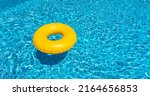 Yellow Ring Floating In Blue...
