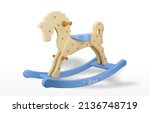 The horse is a wooden toy...