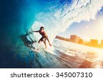 Surfer on blue ocean wave...