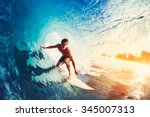 Surfer On Blue Ocean Wave...