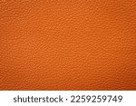 Small photo of Synthetic leather brown background texture. Brown leather textured background.