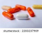 Small photo of Prednisone pill drug close up Glucocorticoid medication used to