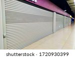 many closed boutiques in Mall during the global quarantine due to coronavirus pandemic. Problems of small businesses and private sellers. closure of shops. Recession and decline in sales in economy.