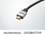 A close up of a HDMI cable on white background