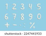 numbers of English alphabet in the form of squeezed cream in white on a blue background.