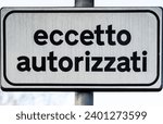 Small photo of road sign bearing the Italian-language words "Except Authorized Persons," implying that access is prohibited except to authorized persons only