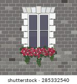Window With Flower On Brick...