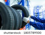 Small photo of New tires that change tires in the auto repair service center in the stock blur for the industry, a four-wheeled tire set at a warehouse