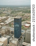 Small photo of Oklahoma City, OK, USA - April 23 2022: BancFirst Tower drone shot ariel view from Devon Tower, downtown of OKC