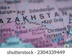 Small photo of Syr Darya river, Kazakhstan on political map of globe, travel concept, selective focus, background