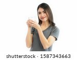 young woman drink water... | Shutterstock . vector #1587343663